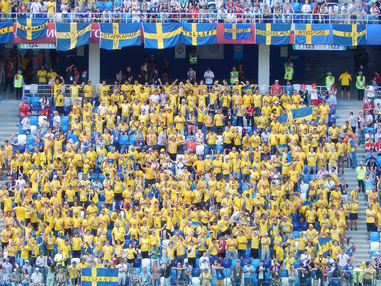 Sweden supporters in yellow and blue at a national-team match